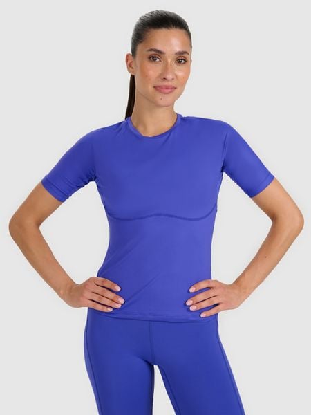 4F Koszulka treningowa slim szybkoschnąca damska - niebieska S. Niebieskie koszulki sportowe damskie 4F, s, bez wzorów, z elastanu, bez ramiączek, na fitness i siłownię. W wyprzedaży za 89.99 zł.