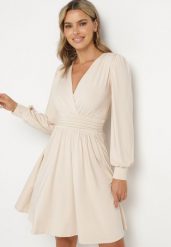 Beżowa Rozkloszowana Sukienka z Wiskozą Selithiel. Brązowe sukienki damskie Born2be, na co dzień, l, bez wzorów, z wiskozy, eleganckie, bez kołnierzyka, bez ramiączek, mini, kopertowe. Za 159.99 zł.