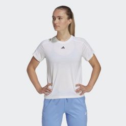Koszulka treningowa damska adidas AEROREADY Essentials. Białe bluzki damskie Adidas, xs, bez wzorów, z materiału, sportowe, bez kołnierzyka, bez ramiączek. Za 128.55 zł.