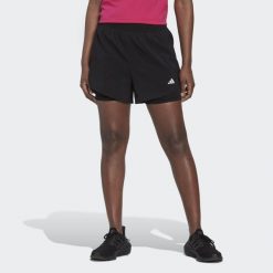 AEROREADY Made for Training Minimal Two-in-One Shorts. Białe szorty damskie Adidas, bez wzorów, z materiału, sportowe. Za 169.55 zł.