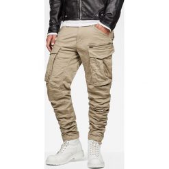 G-Star Raw - Spodnie. Spodnie materiałowe męskie G-Star Raw, bez wzorów, z bawełny. W wyprzedaży za 339.90 zł.