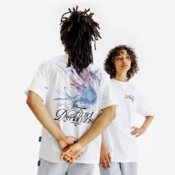 Koszulka z grafiką. Białe bluzki damskie Decathlon, xl, bez wzorów, z bawełny, bez kołnierzyka, bez ramiączek. Za 89.99 zł.