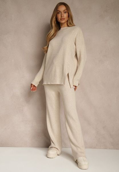 Jasnobeżowy Komplet z Wełną i Bawełną Sweter z Guzikami i Szerokie Spodnie Reinelia. Brązowe swetry nierozpinane damskie Renee, l, bez wzorów, z bawełny, bez kołnierzyka, bez ramiączek. Za 139.99 zł.