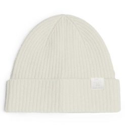 Czapka Tommy Hilfiger. Białe czapki damskie Tommy Hilfiger, na zimę, bez wzorów. Za 269.99 zł.