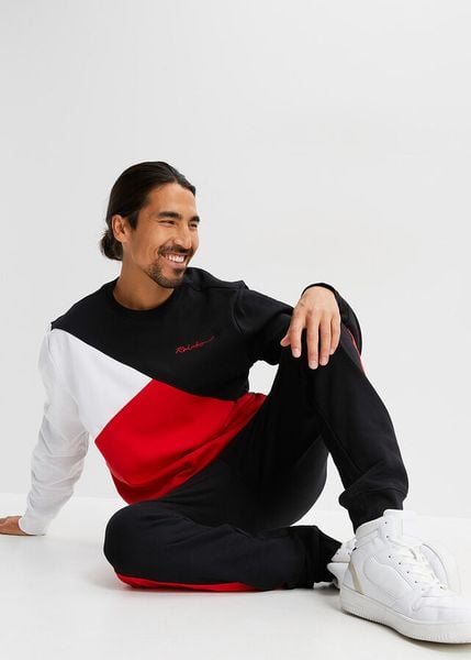 Dres sportowy (2 części). Czarne bluzy sportowe męskie bonprix, l, bez wzorów, z dresówki, bez kaptura. Za 189.99 zł.