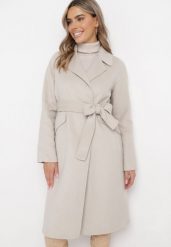 Jasnobeżowy Dwurzędowy Płaszcz Wiązany w Pasie Opulica. Brązowe płaszcze damskie Born2be, l, bez wzorów, z jeansu, biznesowe, bez kołnierzyka, bez kaptura. Za 419.99 zł.