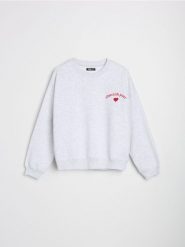 Bluza z napisem - szary. Szare bluzy damskie Sinsay, l, bez wzorów, bez ramiączek, bez kaptura. W wyprzedaży za 19.99 zł.