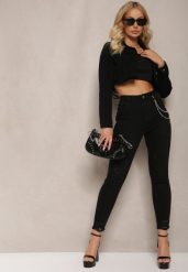 Czarne Jeansy z Łańcuszkiem w Komplecie Ozdobione Dziurami Tiidana. Czarne jeansy damskie Renee, bez wzorów, z bawełny, eleganckie, z podwyższonym stanem. Za 64.99 zł.