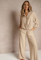 Jasnobeżowy Komplet z Wiskozy w Stylu Oversize Szerokie Spodnie i Luźna Koszula na Guziki Natinne. Brązowe koszule damskie Renee, bez wzorów, z wiskozy, biznesowe, bez kołnierzyka, bez ramiączek. Za 139.99 zł.