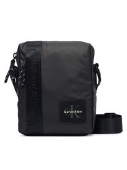 Calvin Klein Saszetka Rubberized Reporter LV04D3480G Czarny. Czarne saszetki i nerki męskie Calvin Klein, bez wzorów, z materiału. Za 329.99 zł.