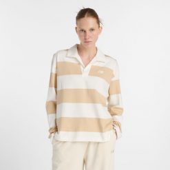 Koszulka damska New Balance WT53522DLA – beżowa. Brązowe bluzki damskie New Balance, m, bez wzorów, z bawełny, klasyczne, bez kołnierzyka, bez ramiączek. Za 329.99 zł.