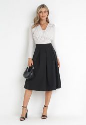 Czarna Rozkloszowana Spódnica Midi z Gumką w Pasie Glorina. Czarne spódnice damskie Born2be, bez wzorów, z tkaniny, midi, rozkloszowane. Za 59.99 zł.