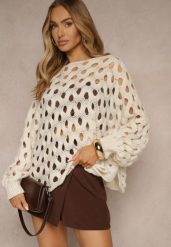 Jasnobeżowy Nietoperzowy Sweter z Dzianiny z Wełną o Ażurowym Splocie Filarasea. Brązowe swetry nierozpinane damskie Renee, w ażurowe wzory, z dzianiny, casualowe, bez kołnierzyka, bez ramiączek. Za 119.99 zł.