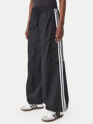 Adidas Spodnie dresowe Firebird Adilenium Twill 3S Cargo Trousers KQ6428 Czarny Relaxed Fit. Czarne spodnie dresowe damskie Adidas, bez wzorów, z dresówki. Za 369.99 zł.