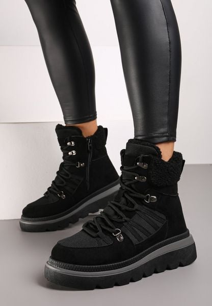 Czarne Traperki na Grubej Podeszwie Ozdobione Futerkiem Linthira. Czarne trapery damskie Born2be, z futra, bez zapięcia. Za 99.99 zł.