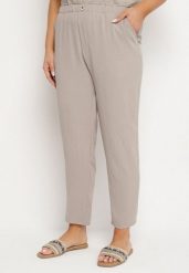 Beżowe Spodnie o Prostym Kroju z Gumką w Talii Filavia. Brązowe spodnie materiałowe damskie Born2be, bez wzorów, z jeansu, eleganckie. Za 59.99 zł.