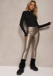 Złote Legginsy z Imitacji Skóry High Waist Ozdobione Wsuwanymi Kieszeniami Valerievia. Żółte legginsy damskie Renee, bez wzorów, z jeansu. Za 29.99 zł.