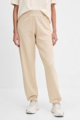 GUESS Beżowe damskie spodnie dresowe Primula, Rozmiar L. Brązowe spodnie dresowe damskie Guess, z aplikacjami, z dresówki. W wyprzedaży za 251.99 zł.