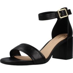 Sandały CLARKS EZORIA MAE Czarny. Czarne sandały damskie Clarks, bez wzorów, z materiału, bez obcasa, bez zapięcia. Za 219.99 zł.