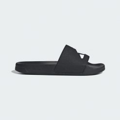 Klapki Adilette Shower. Białe klapki damskie Adidas, bez wzorów, sportowe, bez obcasa, bez zapięcia. Za 119.00 zł.
