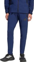 Adidas Spodnie męskie adidas Tiro 26 Travel Woven granatowe KE8364 L. Spodnie sportowe męskie Adidas, l, bez wzorów. Za 301.31 zł.