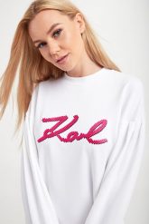 Sukienka dresowa KARL LAGERFELD. Sukienki damskie KARL LAGERFELD, xs, bez wzorów, z dresówki, bez kołnierzyka, bez ramiączek. W wyprzedaży za 593.07 zł.