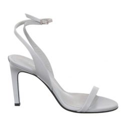 Sandały Calvin Klein w kolorze perłowo-niebieskim. Niebieskie sandały damskie Calvin Klein, bez wzorów, z materiału, bez obcasa, bez zapięcia. Za 489.99 zł.