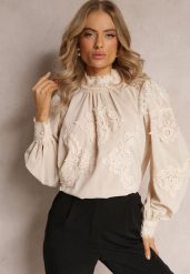 Beżowa Bluzka Ozdobiona Koronką z Półgolfem Esharice. Brązowe bluzki damskie Renee, m, bez wzorów, z koronki, eleganckie, bez kołnierzyka, bez ramiączek. Za 129.99 zł.