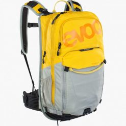 Plecak turystyczny rowerowy Evoc Stage 18L curry - stone 100203613. Żółte plecaki damskie EVOC, bez wzorów, sportowe. Za 571.99 zł.