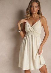 Beżowa Kopertowa Sukienka z Wiskozy Lilisena. Brązowe sukienki damskie Renee, l, bez wzorów, z wiskozy, eleganckie, bez kołnierzyka, bez ramiączek, mini, kopertowe. Za 59.99 zł.
