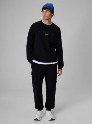 4F Spodnie dresowe cargo męskie - czarne XXL. Czarne spodnie materiałowe męskie 4F, m, z aplikacjami, z dresówki, na fitness i siłownię. Za 229.99 zł.