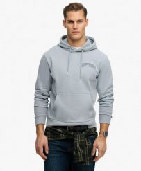 Superdry Bluza z kapturem Athletic Essentials Luźny krój. Niebieskie bluzy damskie Superdry, xl, z aplikacjami, z bawełny, bez ramiączek, z kapturem. Za 352.05 zł.
