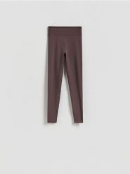 Gładkie legginsy - brązowy. Brązowe legginsy damskie Reserved, bez wzorów, z dzianiny. Za 89.99 zł.