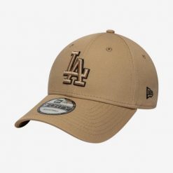 Czapka baseballówka z daszkiem New Era Los Angeles Dodgers. Czapki damskie New Era, bez wzorów, z bawełny, sportowe. Za 119.99 zł.