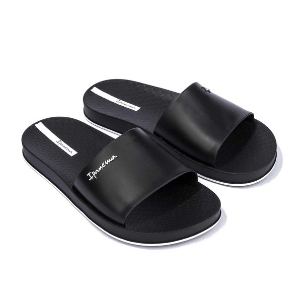 Klapki Ipanema Slide Unisex. Czarne klapki męskie Ipanema, bez wzorów, bez zapięcia. Za 69.99 zł.