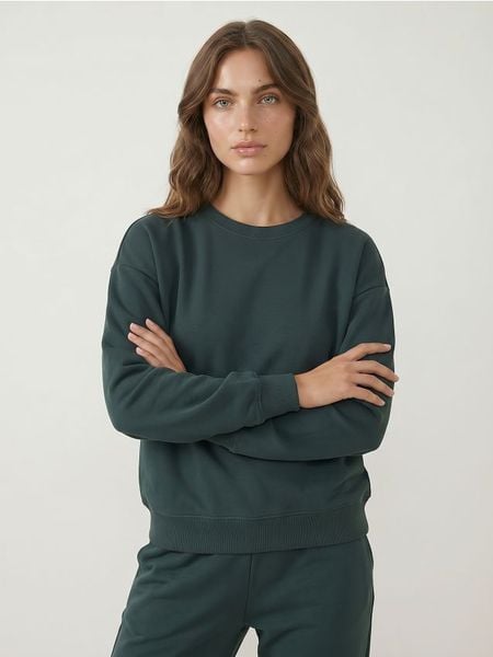 Dresowa bluza crewneck basic - zielony. Zielone bluzy damskie Sinsay, l, bez wzorów, z dresówki, sportowe, bez ramiączek, bez kaptura. Za 35.99 zł.