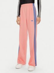 Adidas Spodnie dresowe adicolor Classic Firebird JP2312 Różowy Loose Fit. Czerwone spodnie dresowe damskie Adidas, bez wzorów, z dresówki. Za 269.99 zł.