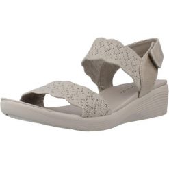 Sandały SKECHERS ARYA Beżowy. Brązowe sandały damskie Skechers, bez wzorów, z materiału, bez obcasa, bez zapięcia. Za 207.99 zł.