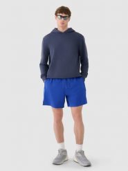 4F Spodenki casual męskie - niebieskie M. Niebieskie szorty męskie 4F, bez wzorów, z dresówki, casualowe. W wyprzedaży za 79.99 zł.
