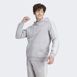 Bluza męska adidas Essentials Fleece 3-Stripes Hoodie. Białe bluzy sportowe męskie Adidas, m, bez wzorów, z materiału, z kapturem, do biegania. Za 219.00 zł.