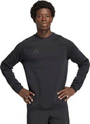 Adidas Bluza męska adidas Tiro 26 Travel Crew czarna JM5540 L. Czarne bluzy męskie Adidas, l, bez wzorów, bez ramiączek, bez kaptura. Za 258.11 zł.