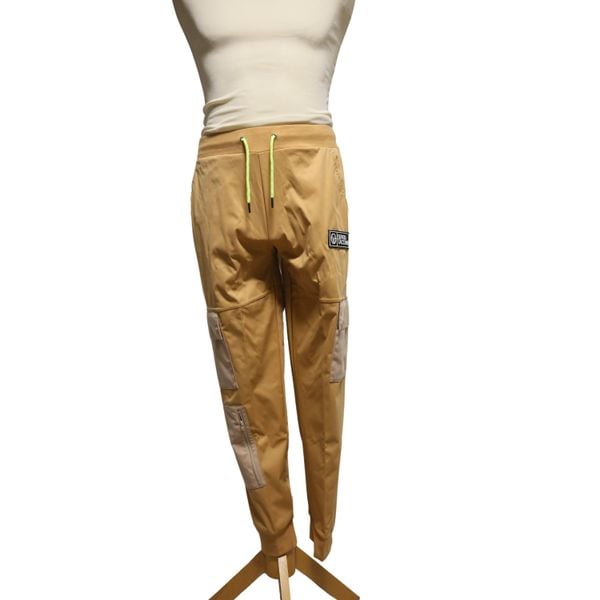 Spodnie do biegania Sergio Tacchini Besil. Brązowe spodnie sportowe męskie sergio tacchini, m, bez wzorów, do biegania. W wyprzedaży za 335.50 zł.