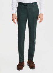 PAKO LORENTE – Gładkie spodnie garniturowe w kolorze zielonym. Zielone eleganckie spodnie męskie Pako Lorente, m, bez wzorów, z elastanu, eleganckie. Za 399.99 zł.