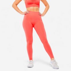 Legginsy fitness damskie Domyos Push Up. Czerwone legginsy damskie DOMYOS, bez wzorów, z elastanu. Za 79.99 zł.