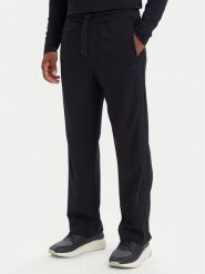 BOSS Spodnie dresowe Union Tape Hurley 50564110 Granatowy Regular Fit. Niebieskie spodnie sportowe męskie Boss, m, bez wzorów, z dresówki. Za 799.99 zł.
