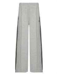 Adidas Spodnie dresowe adicolor Spacer 3-Stripes JV7497 Zielony Wide Leg. Zielone spodnie dresowe damskie Adidas, bez wzorów, z bawełny. Za 349.99 zł.