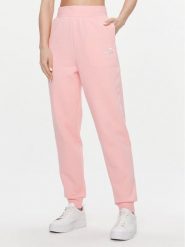 Puma Spodnie dresowe Ess+ Embroidery 670007 Różowy Regular Fit. Czerwone spodnie dresowe damskie Puma, bez wzorów, z dresówki. Za 139.99 zł.