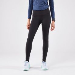 Legginsy do biegania damskie Kiprun Run 500 Warm ocieplane. Czarne legginsy damskie KIPRUN, bez wzorów, z elastanu. Za 139.99 zł.