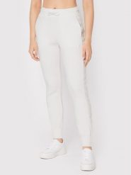 Guess Spodnie dresowe V2YB18 K7UW2 Biały Regular Fit. Białe spodnie dresowe damskie Guess, z aplikacjami, z dresówki. Za 189.99 zł.