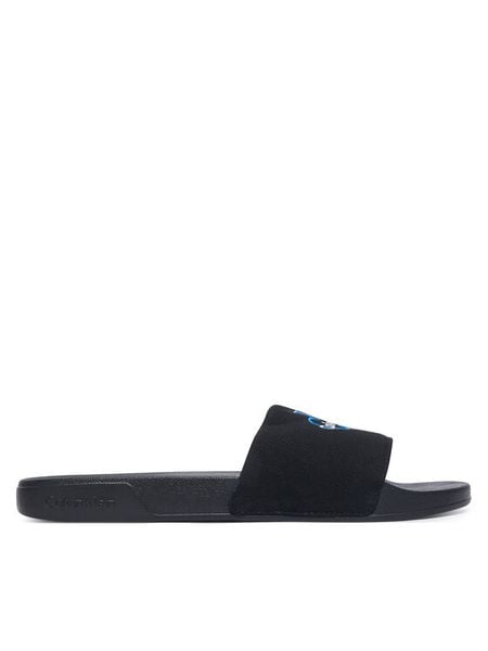 Calvin Klein Klapki Ee Slide Cv YM0YM01393 Czarny. Czarne klapki męskie Calvin Klein, bez wzorów, z materiału, bez zapięcia. Za 142.99 zł.